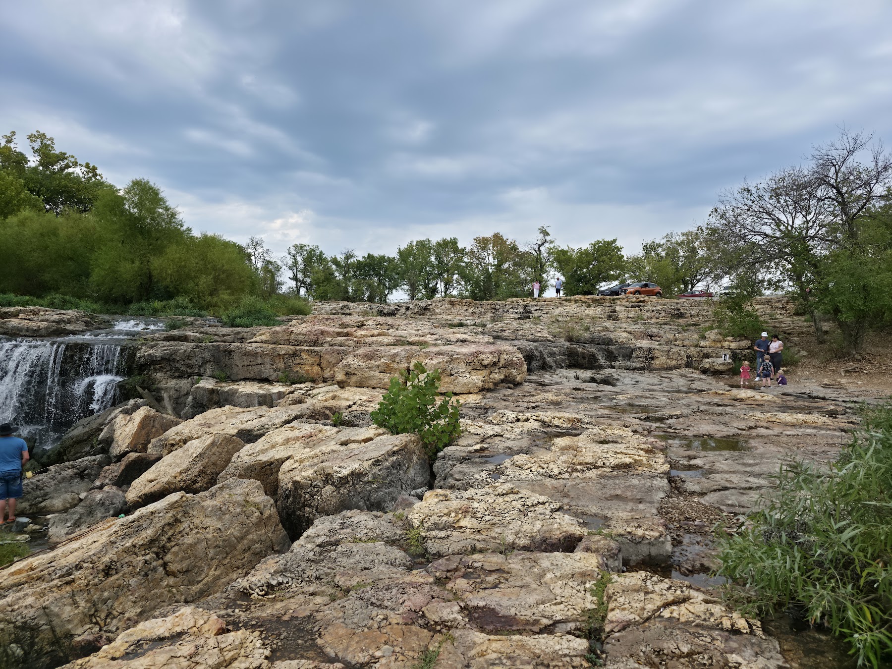 The wide expanse of Grand Falls cascades over a long rock ledge in Missouri.