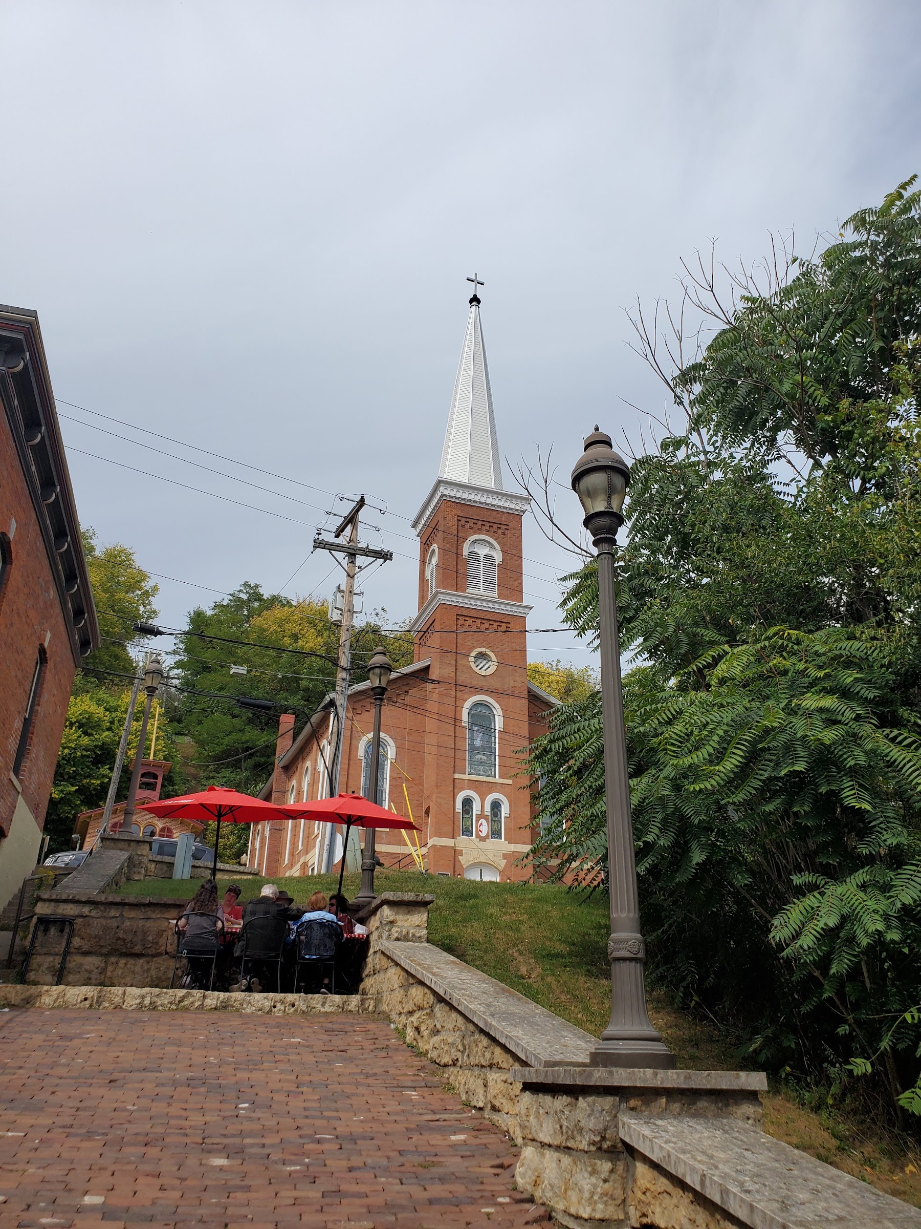 Historic red brick buildings with detailed awnings line the main street of Galena, Illinois.