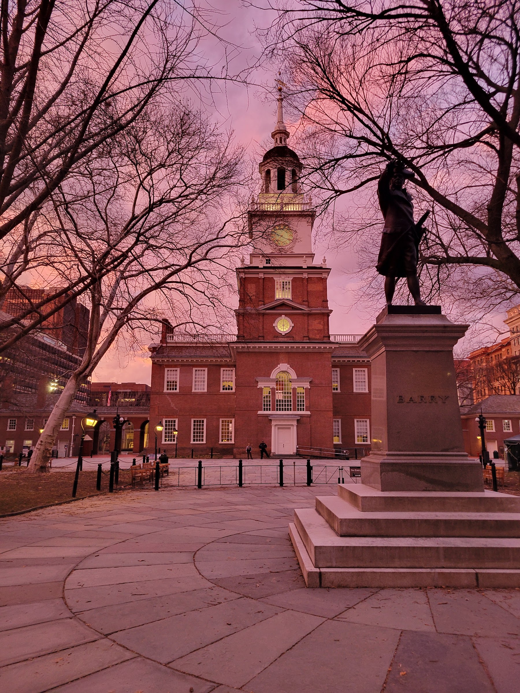 The historic bell tower of Independence Hall against a clear blue sky.