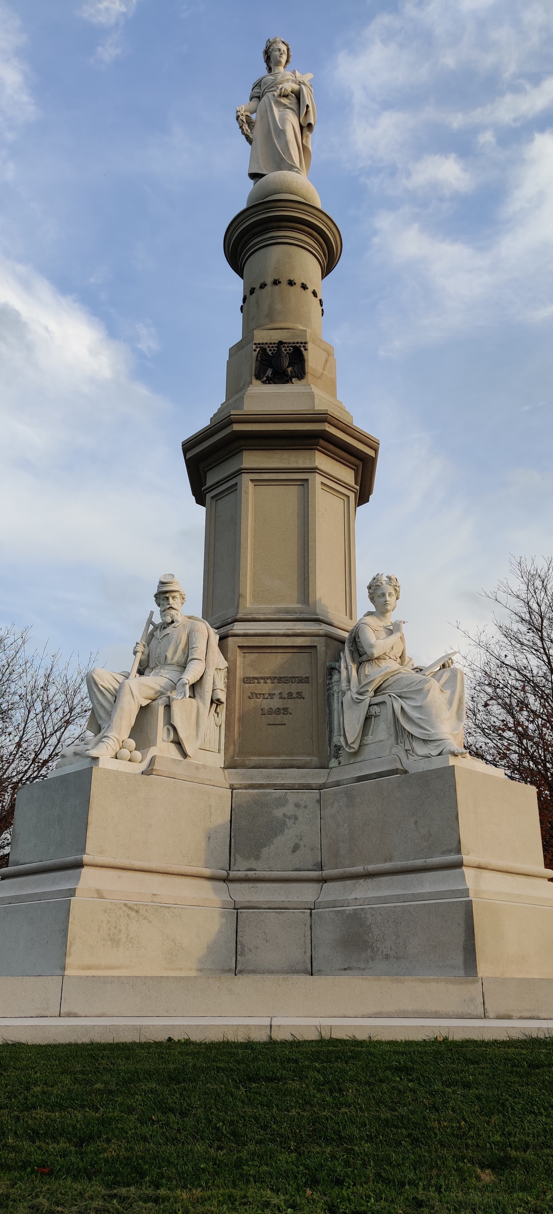 The iconic Pennsylvania State Memorial monument at Gettysburg National Military Park on a clear day.